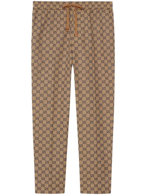 Nuova collezione di pantaloni sportivi Gucci uomo su FARFETCH.